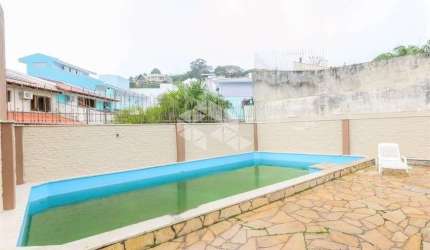 Casa de 4d com piscina e vista do Guaíba no Alto Teresópolis