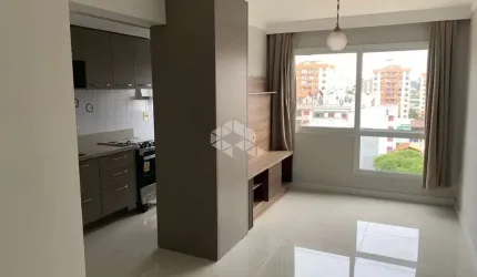 Apartamento com dois dormitórios e vaga de garagem em Porto Alegre.