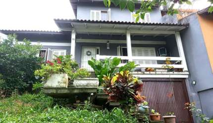 Casa com 5 quartos  à  Venda, Vila Nova, Porto Alegre.