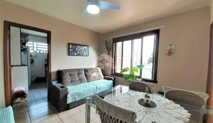 Apartamento 3 dormitórios, reformado, e 1 vaga de garagem no bairro Passo Dareia, em Porto Alegre. Aceita financiamento e FGTS