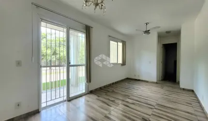 Apartamento 2 Dormitórios, 1 vaga de garagem com pátio no Bairro Humaitá, em Porto Alegre