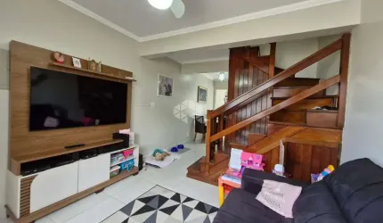 Casa em condomínio 2 dormitórios, semimobiliada,1 vaga de garagem, no bairro Humaitá