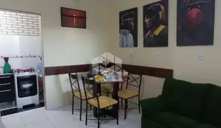 Sobrado de 2 dormitórios e 1 vaga de garagem, no bairro Jardim dos Lagos, em Guaíba.