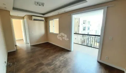 Apartamento de 2 dormitórios, sacada integrada e churrasqueira no bairro Humaitá, Porto Alegre