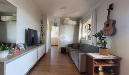 Apartamento de 2 dormitórios e 2 vagas de garagem, no bairro Humaitá, em Porto Alegre.