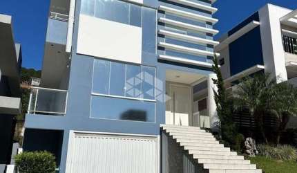 CASA DE 4 DORMITÓRIOS NO BAIRRO MONTE VERDE - FLORIANÓPOLIS/SC
