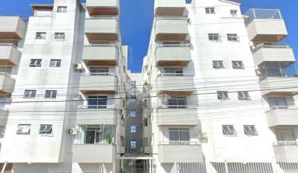 APARTAMENTO COM DOIS QUARTOS E UMA SUITE NO BAIRRO CAPOEIRAS - FLORIANÓPOLIS/SC