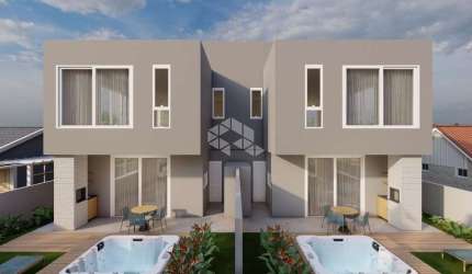 CASA GEMINADA COM 3 SUITES NO RIO TAVARES/ FLORIANOPOLIS