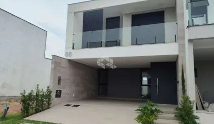 CASA 3 SUÍTES CONDOMÍNIO FECHADO EM BIGUAÇU/SC