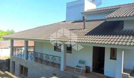 Casa com 3 dormitórios sendo 1 suíte no bairro Floresta em Estância Velha