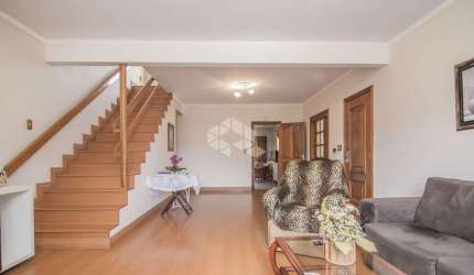 Casa com 2 dormitórios com 2 vagas, no bairro Partenon em Poa/Rs.