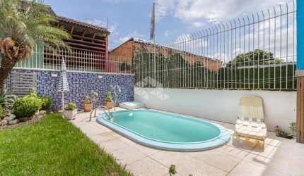 Casa 3 dormitórios com piscina  no bairro  Ipanema, Porto Alegre