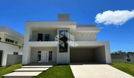 Casa de Alto Padrão em Condomínio Fechado na praia dos Ingleses com 400 m², 4 quartos e 3 suítes
