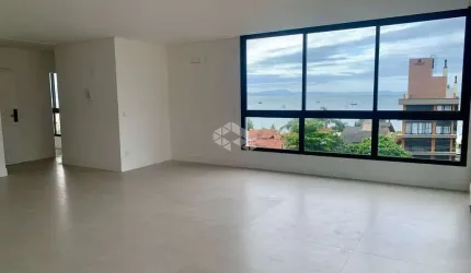Apartamento à venda em Jurerê com vista mar