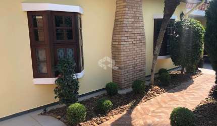 Casa Térrea à venda na Granja Julieta com 4 dormitórios sendo 4 suítes, lavabo, ar condicionado, jardim, 4 vagas,