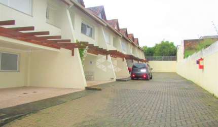 CASA CONDOMÍNIO 2 DORMITÓRIOS/QUARTOS 2 BOX/VAGAS