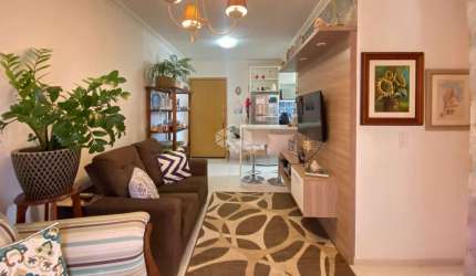 Apartamento, 2 dormitórios, 1 vaga coberta, cozinha sob medida, porcelanato, varanda com churrasqueira, sol da tarde, Vila Rosa, Novo Hamburgo