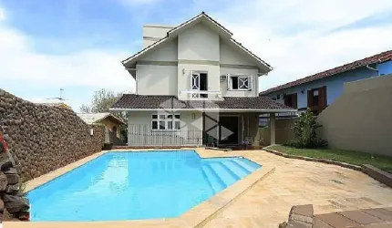 Casa 4 dormitórios, piscina no Bairro  Primavera em Novo Hamburgo