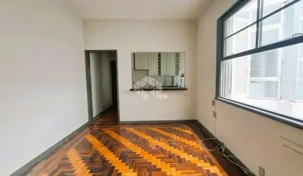 Apartamento de 3 dormitórios de frente com sacada a metros do Parque da Redenção