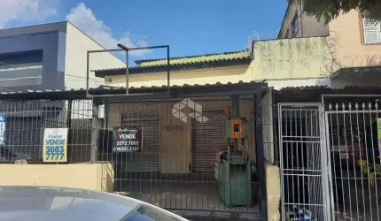 Terreno com duas lojas comerciais e dois apartamentos Jk Medianeira