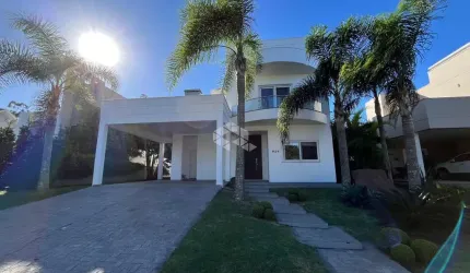 Casa com 4 dormitórios em condomínio Fechado
