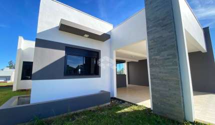 AMPLA CASA NO LOTEAMENTO NOVA SANTA CRUZ II COMPOSTA POR 3 DORMITÓRIOS SENDO 1 SUÍTE