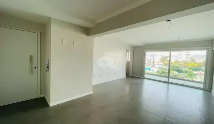 APARTAMENTO CENTRAL COM DOIS DORMITÓRIOS