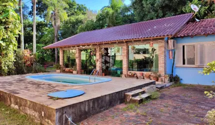 Casa com 292 m² e 4 quartos à venda no bairro Tristeza