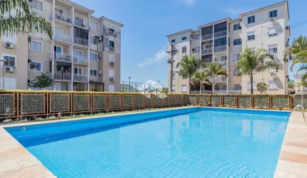 Apartamento  2 dormitórios/Quartos. Sacada. 1 Vaga Escriturada.