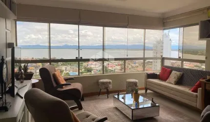 Tramandaí bairro Centro - apartamento 2 dormitórios, suíte e 1 garagem.