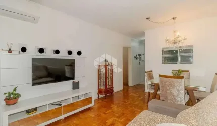 Amplo apartamento com 4 dormitórios e 2 vagas cobertas no bairro Auxiliadora.