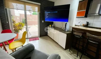 Casa/sobrado em condomínio fechado com 2 dormitórios, sendo 2 suíte, garagem e pátio com piscina no bairro Hípica