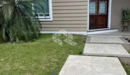 Casa em condomínio fechado com 3 quartos à venda na Avenida Senador Salgado Filho, 8500, Jardim Krahe, Viamão, 260 m2 por R$ 1.490.000