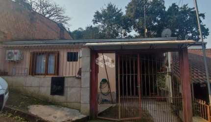 CASA TRÊS DORMITÓRIOS-  LOMBA DO PINHEIRO POA