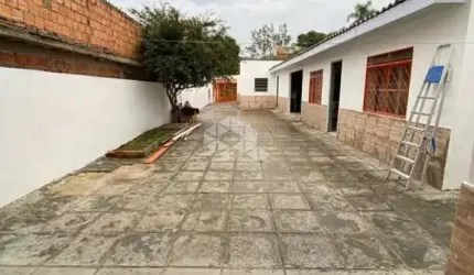 TERRENO COM 03 CASAS NA STA ISABEL- RS