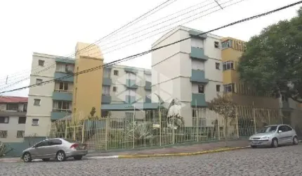 VENDO: Apartamento amplo com  dois quartos, e um box  de garagem no Pio X.