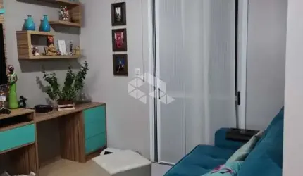 Apartamento com 55m semi mobiliado com 2 dormitórios uma vaga de garagem coberta no bairro Desvio Rizzo