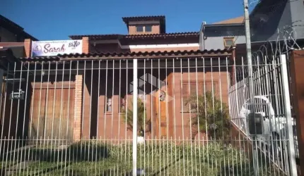 Casa 03 dormitórios e 03 vagas com 215m²  no bairro Vila Nova em Poa.