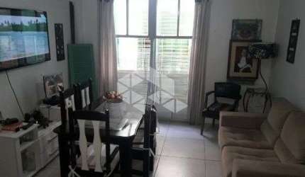Apartamento 2 dormitórios, térreo com pátio privativo e vaga no Bairro Jardim Carvalho em Porto Alegre.
