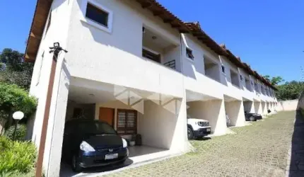 CASA EM CONDOMÍNIO 3 QUARTOS E 2 VAGAS DE GARAGEM NO BAIRRO TRISTEZA