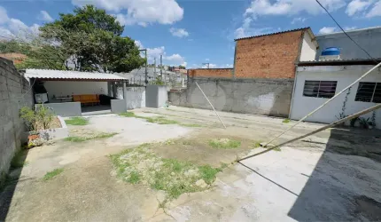 Terreno com casa térrea