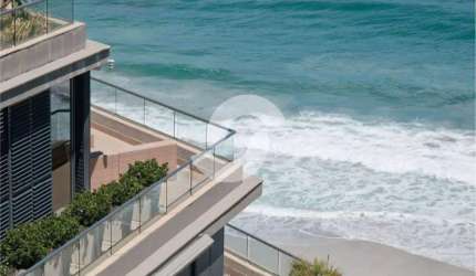Apartamento frente mar com 4 suítes e 3 vagas em Camboinhas
