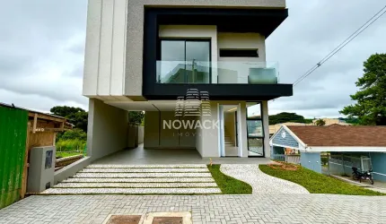 CASA DE ALTO PADRÃO EM CONDOMÍNIO COM 3 SUÍTES E 4 VAGAS EM SANTA FELICIDADE