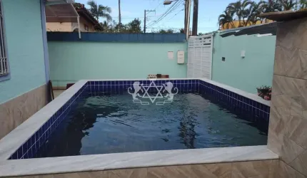 Casa à venda na Praia de Massaguaçu, com 03 suítes , área gourmet completa com churrasqueira e pisc