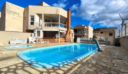 Casa em condomínio com 2 dormitórios à venda, 77m2 - Massaguaçu - Caraguatatuba/Sp