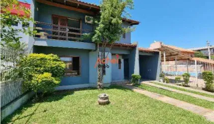 Casa usada em Porto Alegre, bairro Cavalhada, semimobiliada, com área de serviço e sacada