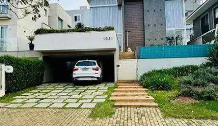 CASA EM CONDOMÍNIO 4 DORMITÓRIOS (300m²), 4 SUÍTES, MOBILIADA, VARANDA, 4 VAGAS. NO CONDOMÍNIO BURLE MARX