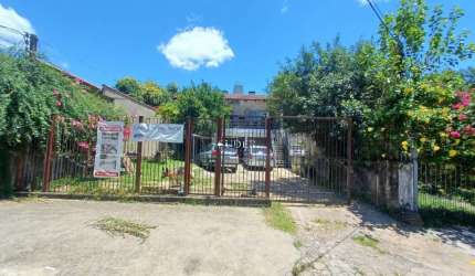 Casa com 4 quartos à venda na Rua André Arjonas Guillen, 16, Passo da Areia, Porto Alegre por R$ 1.060.000