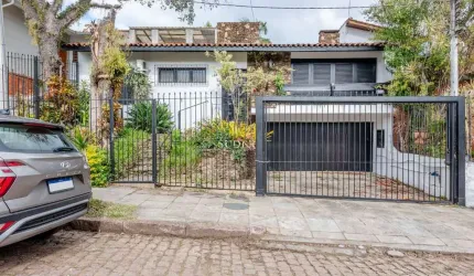 Casa com 4 quartos à venda na Rua Professor Fernando Carneiro, 102, Três Figueiras, Porto Alegre por R$ 1.250.000