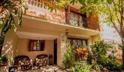 Casa com 4 quartos à venda na Rua Sorocaba, 69, Passo da Areia, Porto Alegre por R$ 870.000